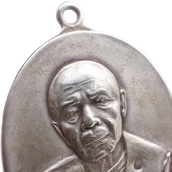 Luang Pu Tim Isariko Silver Amulet Coin