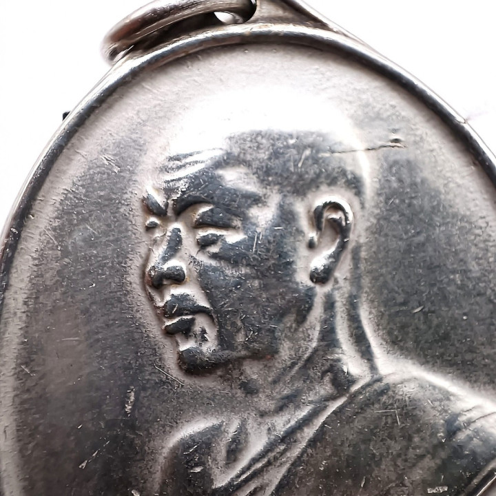 Luang Pu Fan Ajaro 2507 BE Silver Coin Amulet