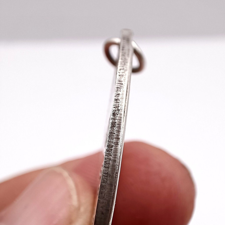 Luang Pu Fan Ajaro 2507 BE Silver Coin Amulet
