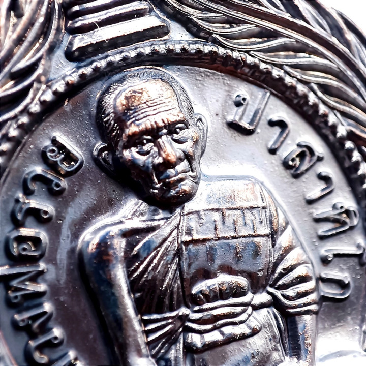 Luang Por Ruay Ruen Pan Lan Copper Amulet